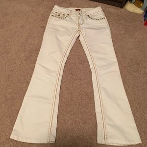 NWOT jeans size 5. Brand Lamasani